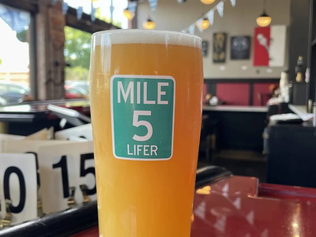 Mile 5 Lifer Club members enjoying pours at South of Shaw Beer Company in Fresno